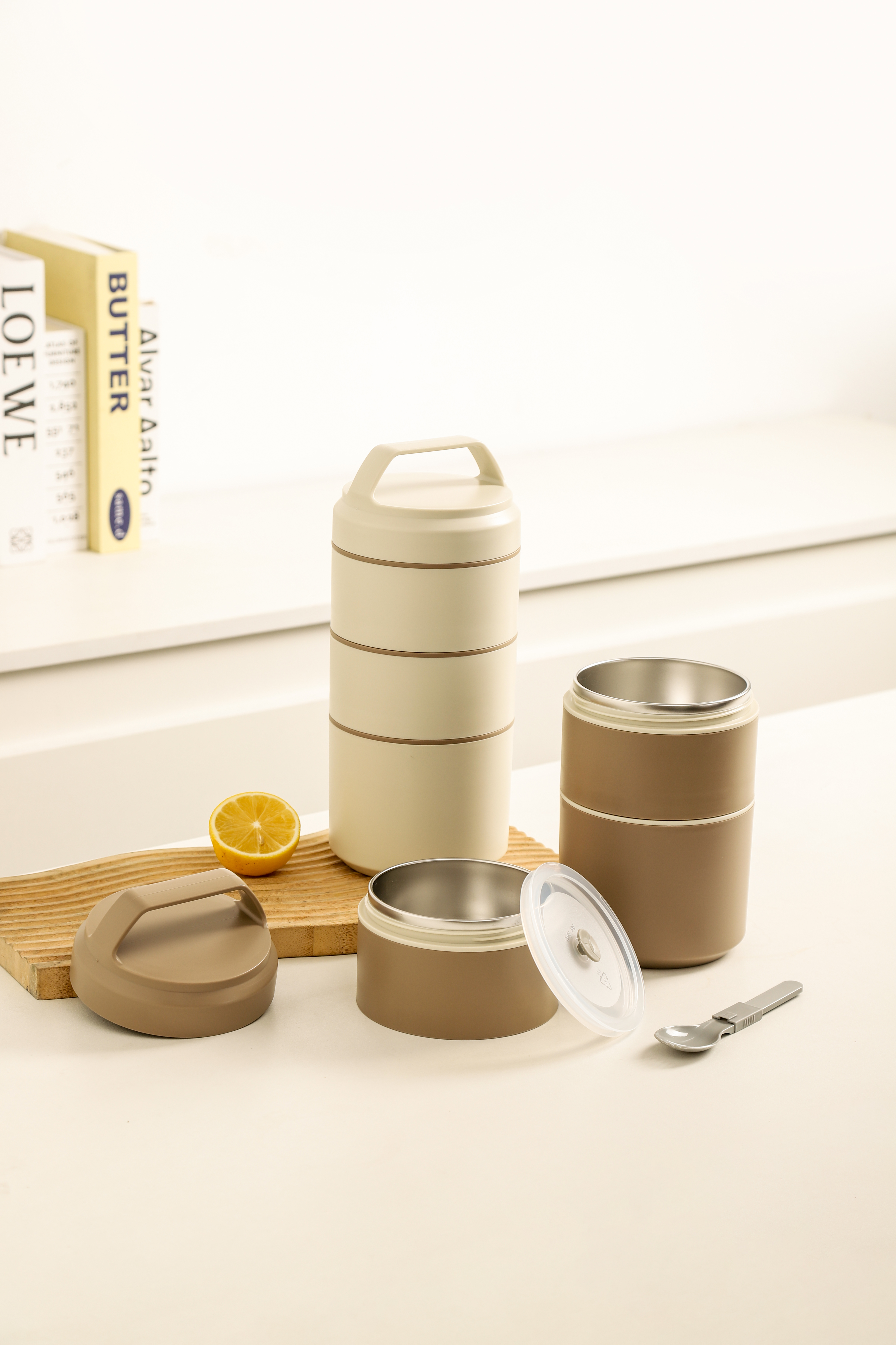 Beige and Khaki stainless steel insulated food jar set with stackable containers, airtight lids, and a folding spoon